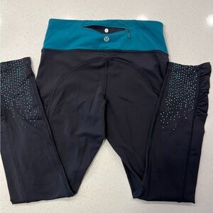 Lululemon Speed Tight II pants in a black and Forage Teal Size 4